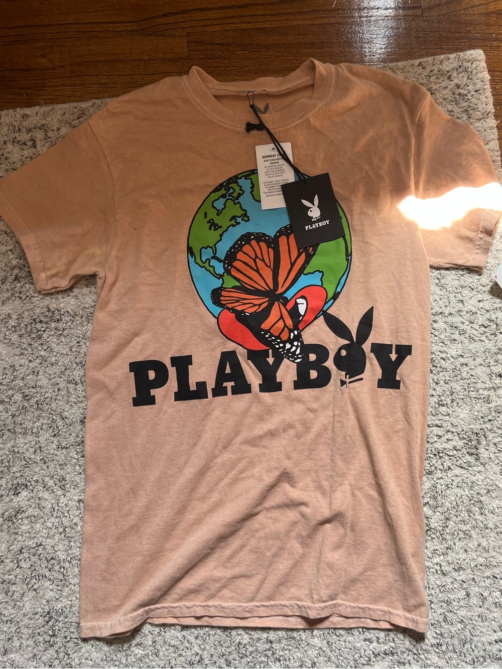 PLAYBOY Peach Short Sleeve Tee with Earth & Butterfly Graphic
